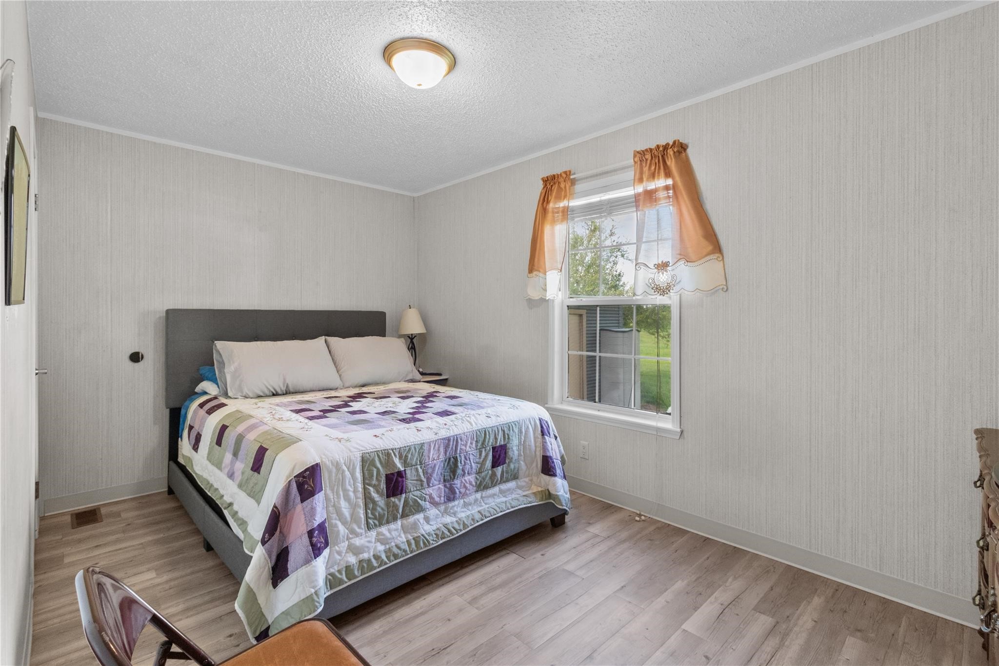 845 County Road 281 Sargent, TX 77414 - Photo 17 of 22 a bedroom with a bed and a window