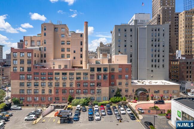 111 Mulberry Street, Unit 3P Newark, NJ 07102 - Photo 2 of 2 a city view with tall buildings