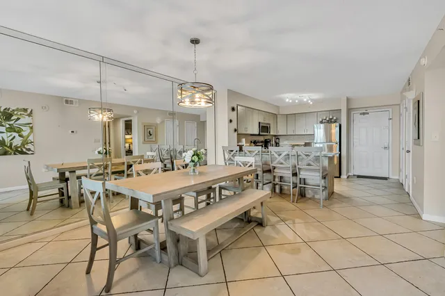 a view of a kitchen and dining room