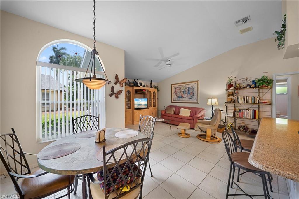 3971 Spring Garden Lane Estero, FL 33928 - Photo 15 of 31 a view of a livingroom and dining room