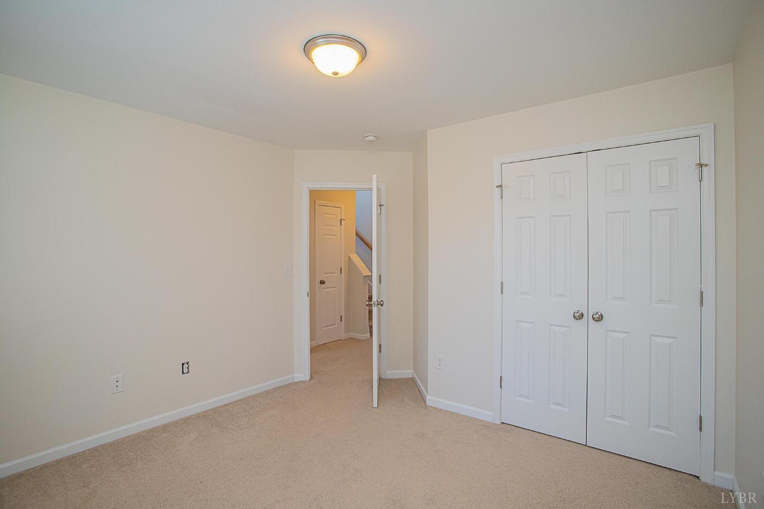 2417 River Road Madison Heights, VA 24572 - Photo 11 of 35 an empty room with closet area