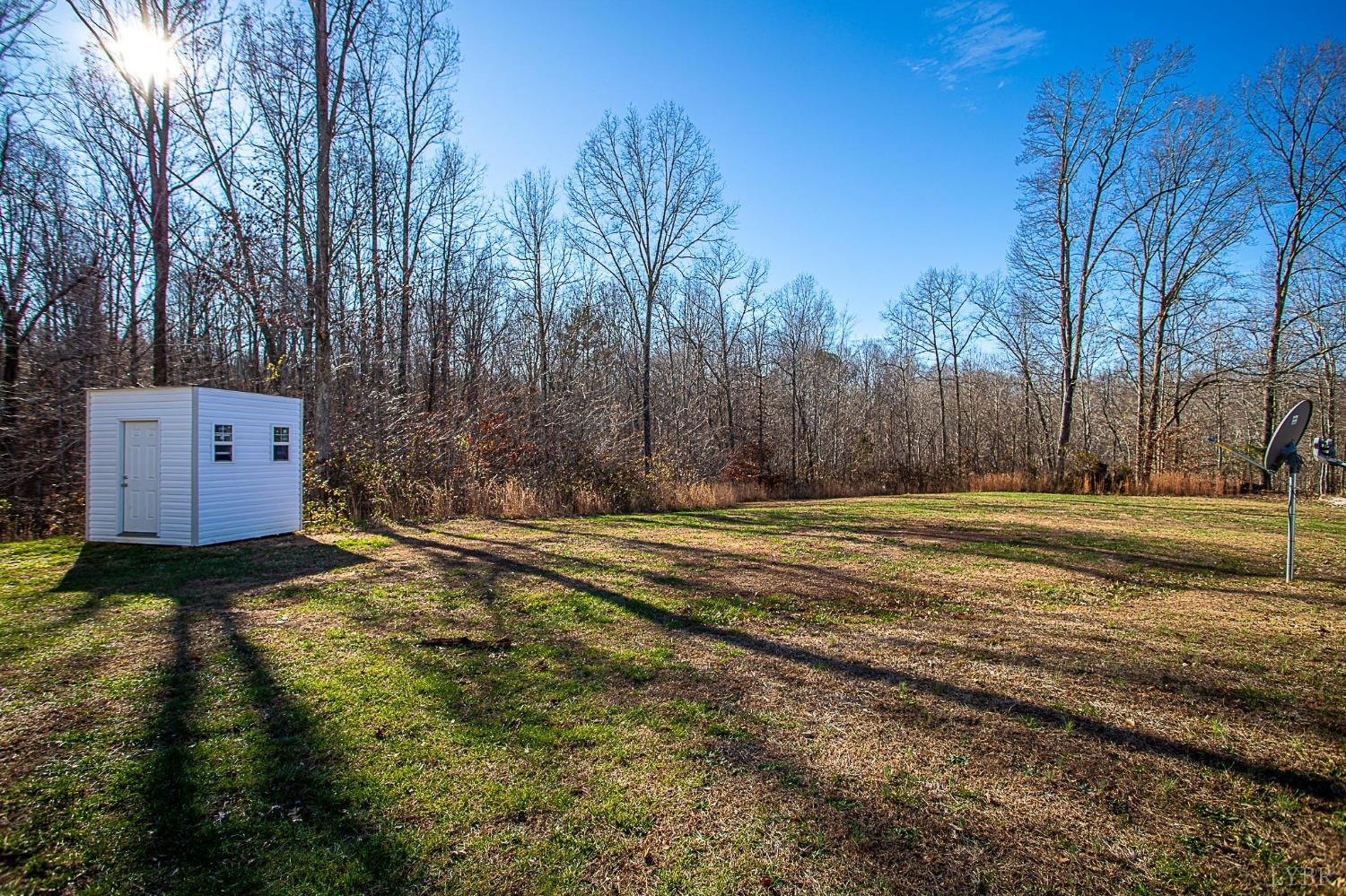 2417 River Road Madison Heights, VA 24572 - Photo 34 of 35 a view of backyard space and trees