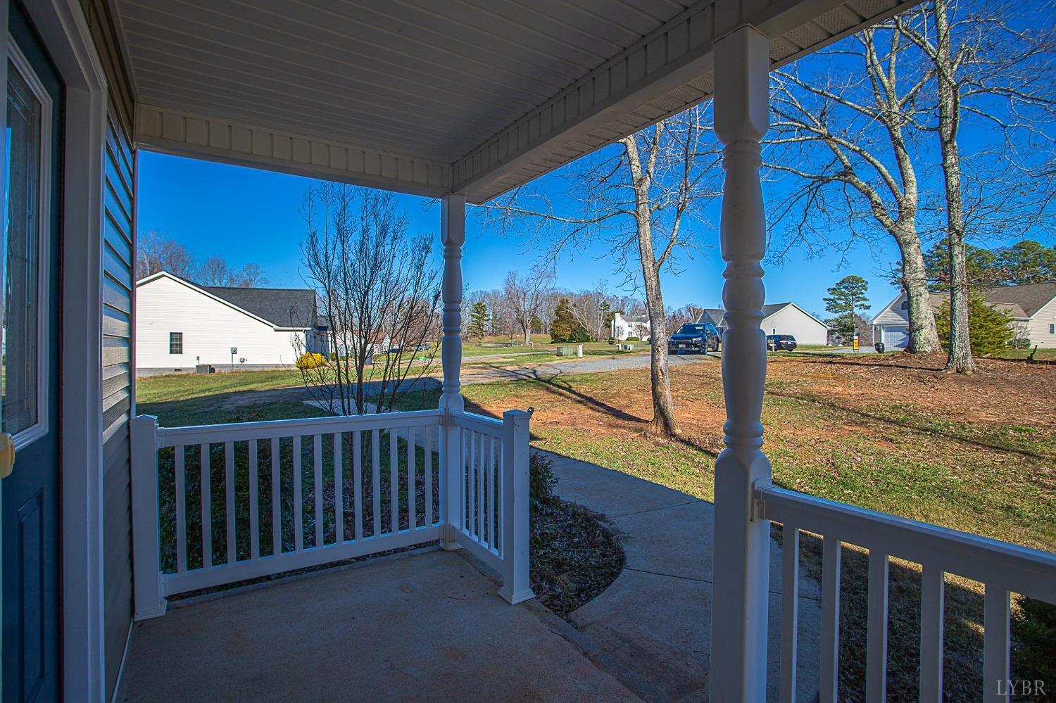 2417 River Road Madison Heights, VA 24572 - Photo 4 of 35 a view of a porch with wooden floor and fence