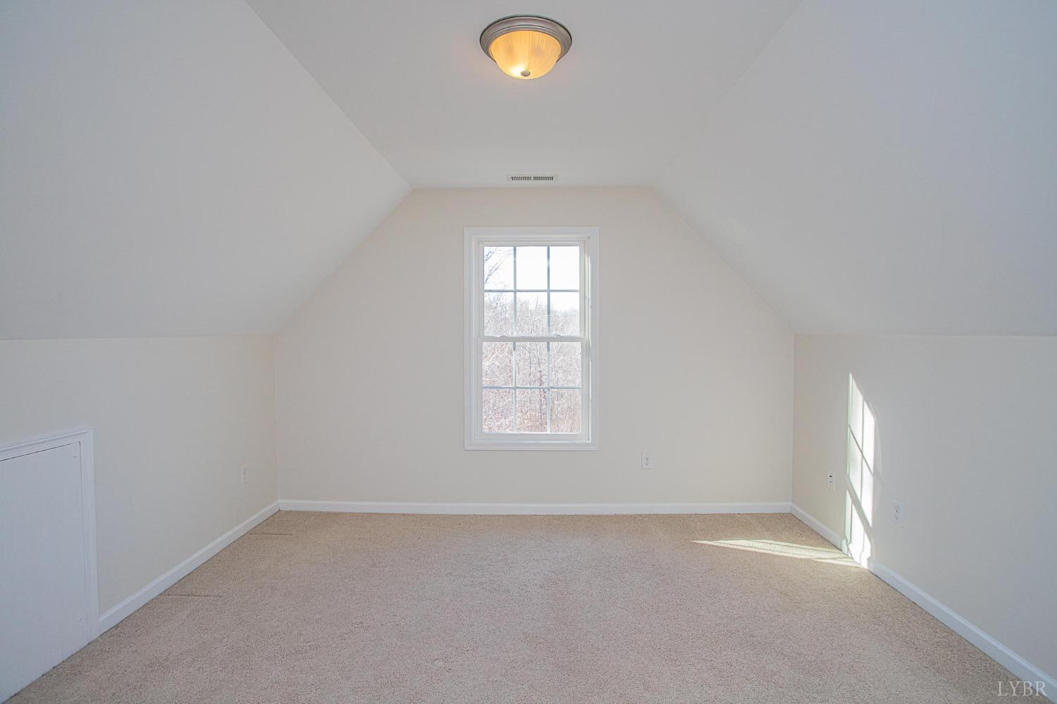 2417 River Road Madison Heights, VA 24572 - Photo 7 of 35 an empty room with a window
