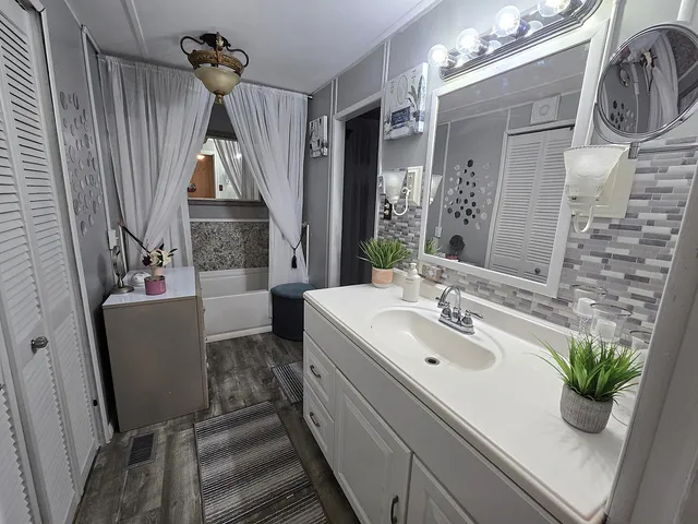 a view of a chairs and table in the patio