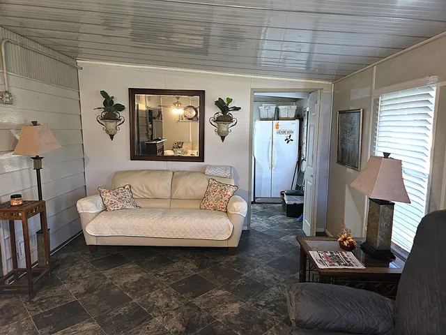a view of a car in front of a house