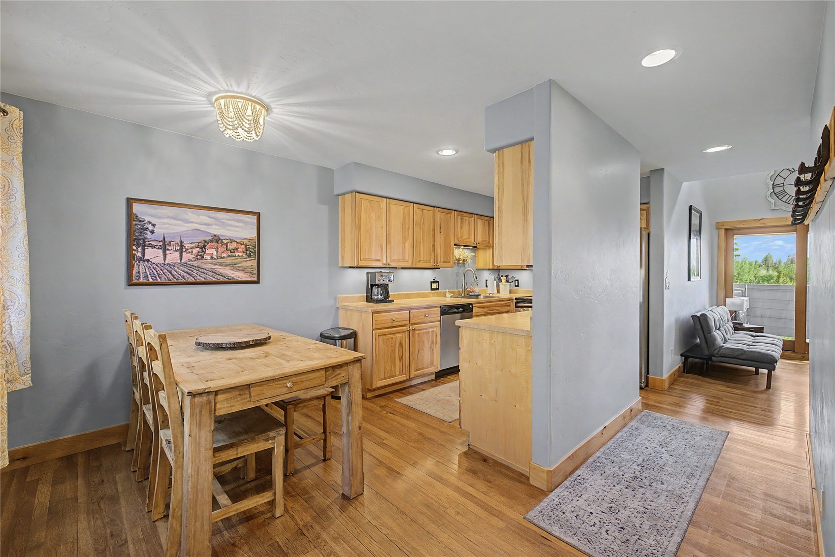 6726 Ryan Gulch Road, Unit 6726 Wildernest, CO 80498 - Photo 5 of 39 a kitchen with a refrigerator a stove top oven a sink and dishwasher