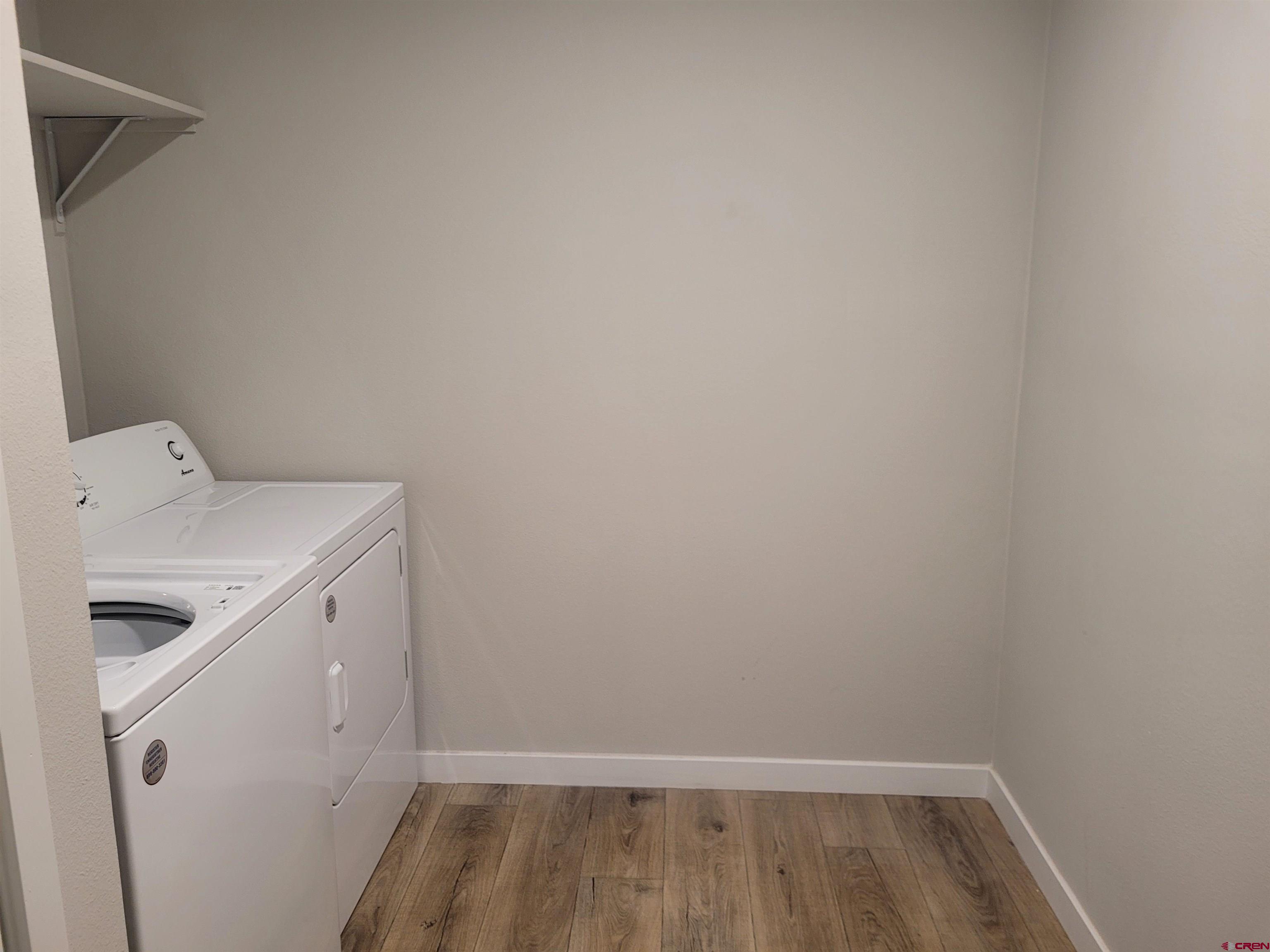 305 9th Street Saguache, CO 81149 - Photo 17 of 32 a utility room with dryer and washer