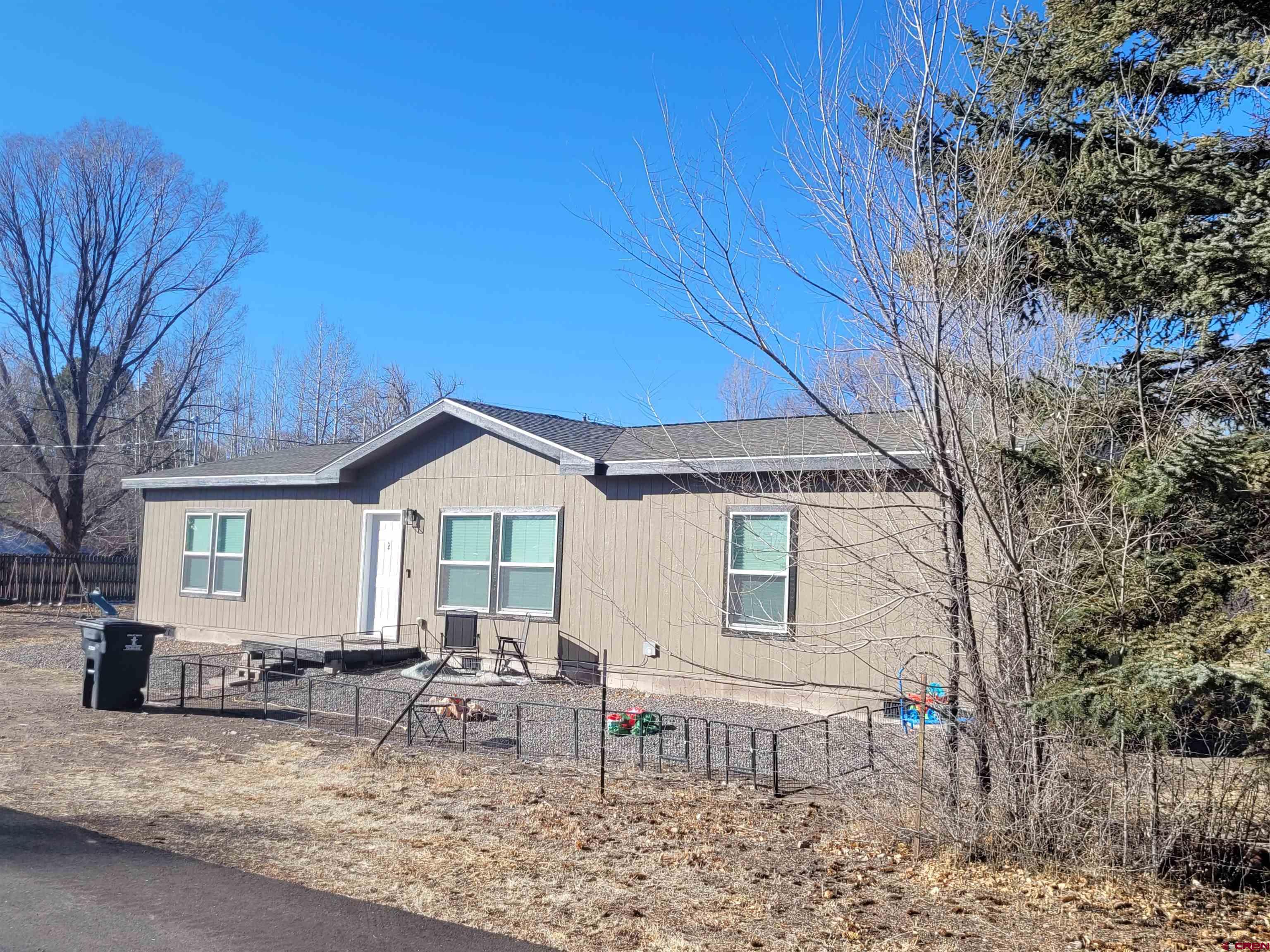 305 9th Street Saguache, CO 81149 - Photo 2 of 32 a view of a house with a patio