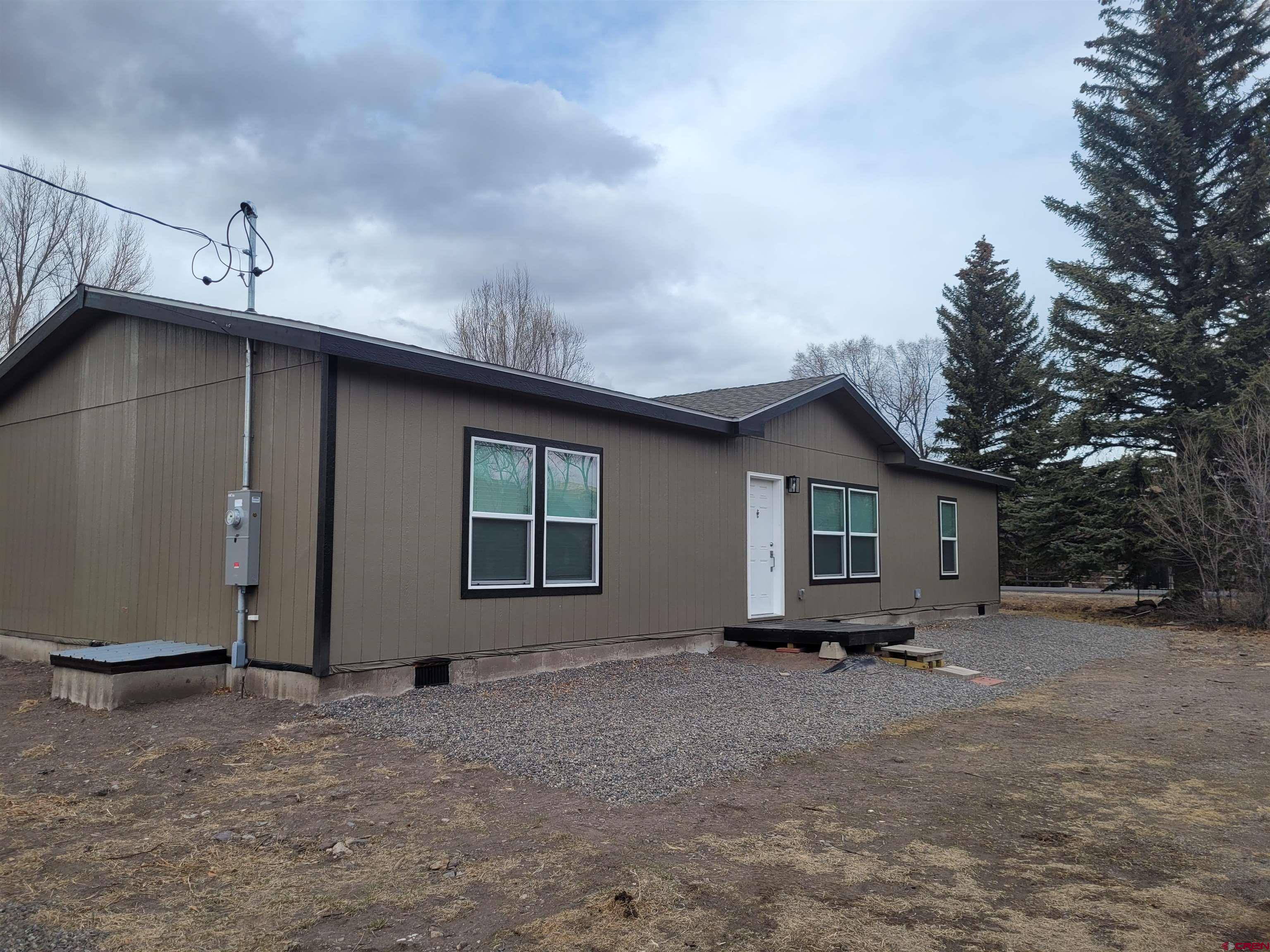 305 9th Street Saguache, CO 81149 - Photo 24 of 32 a house view with a backyard space