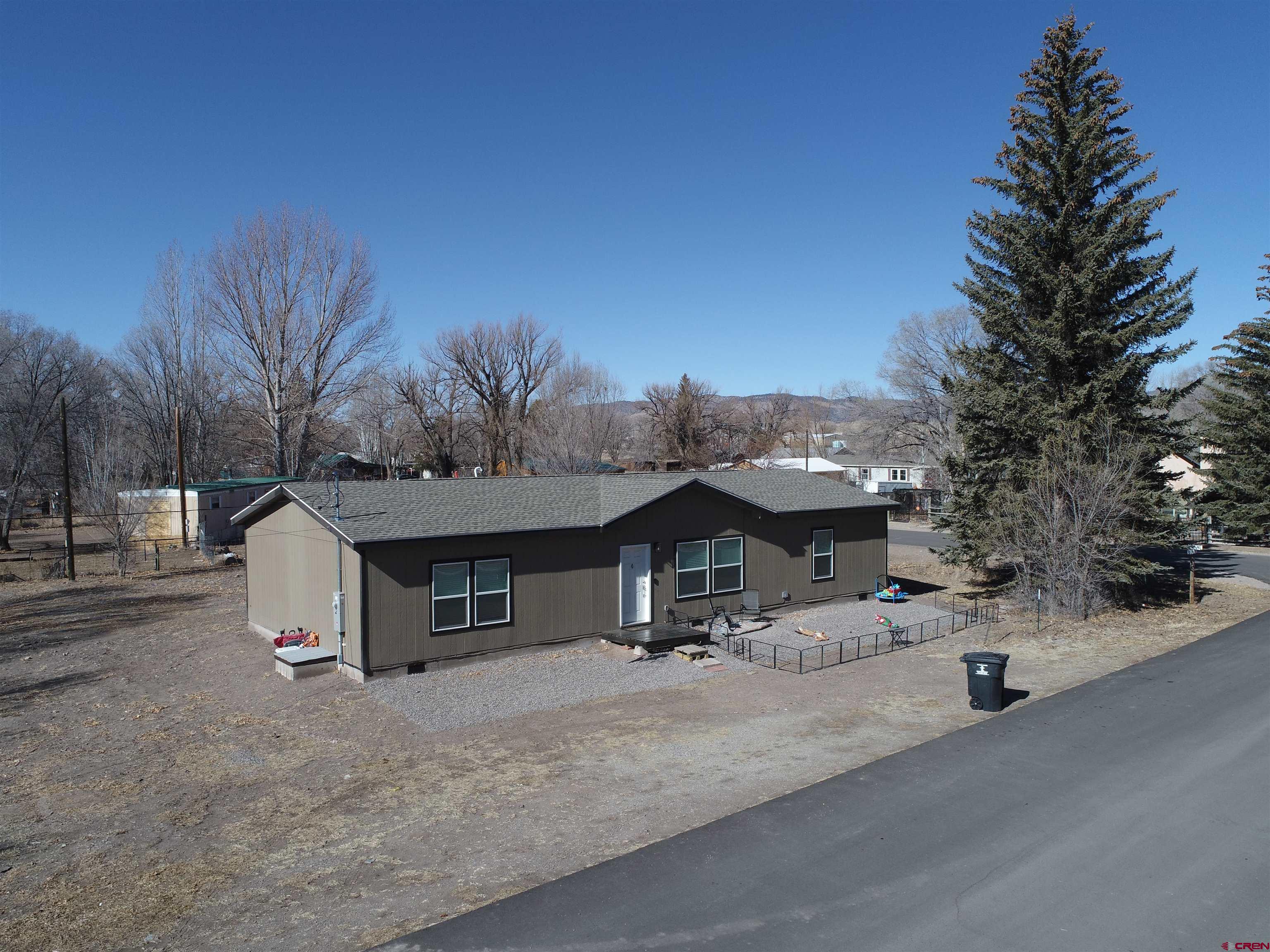 305 9th Street Saguache, CO 81149 - Photo 32 of 32 a view of a house with a outdoor space and sitting area