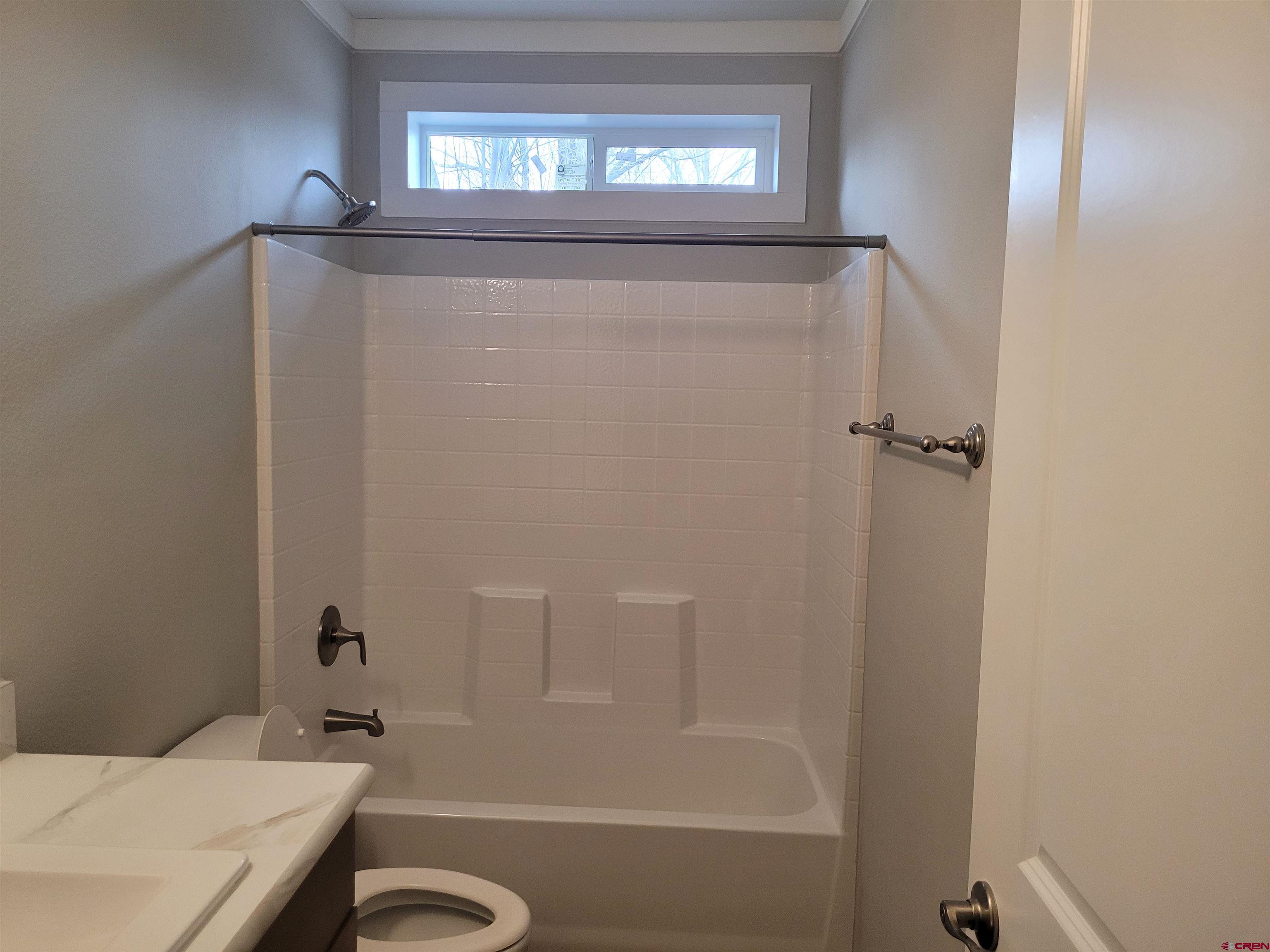 305 9th Street Saguache, CO 81149 - Photo 9 of 32 a bathroom with a sink and a mirror