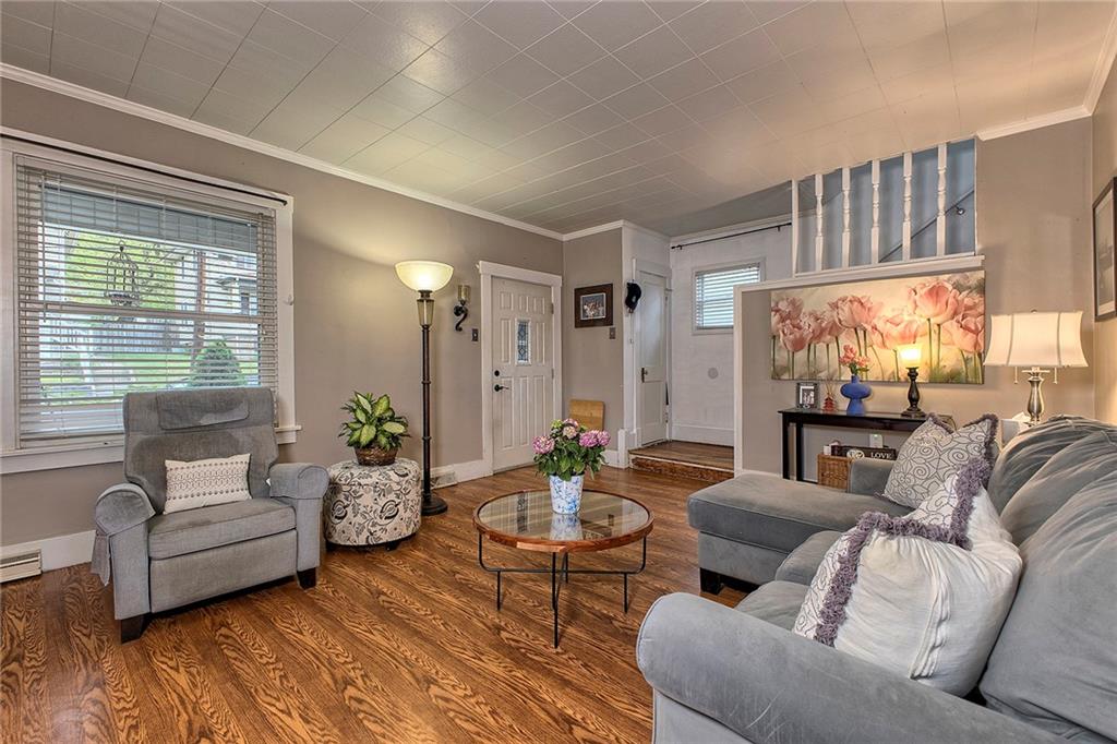 771 6th Street Beaver, PA 15009 - Photo 6 of 28 a living room with furniture and a large window