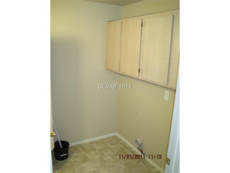 7885 West Flamingo Road, Unit 2009 Las Vegas, NV 89147 - Photo 10 of 35 Other. Laundry Room with Cabinets