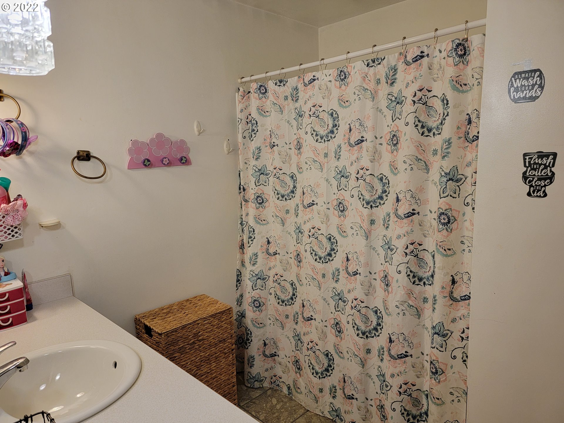 2287 8th Street Springfield, OR 97477 - Photo 13 of 18 a bathroom with a sink and a toilet