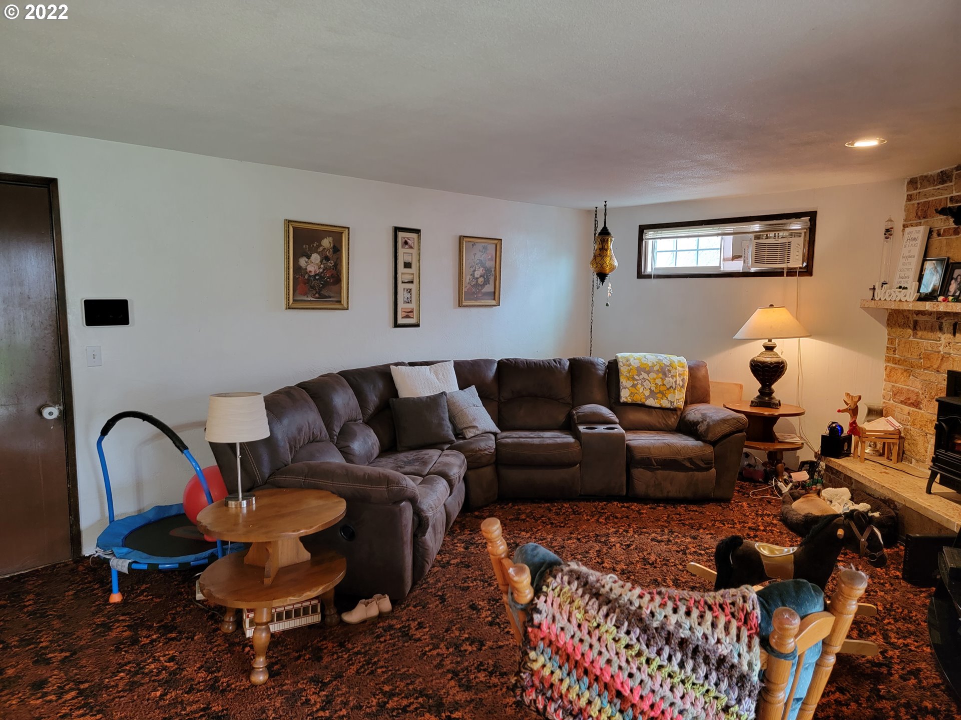 2287 8th Street Springfield, OR 97477 - Photo 6 of 18 a living room with furniture and a rug