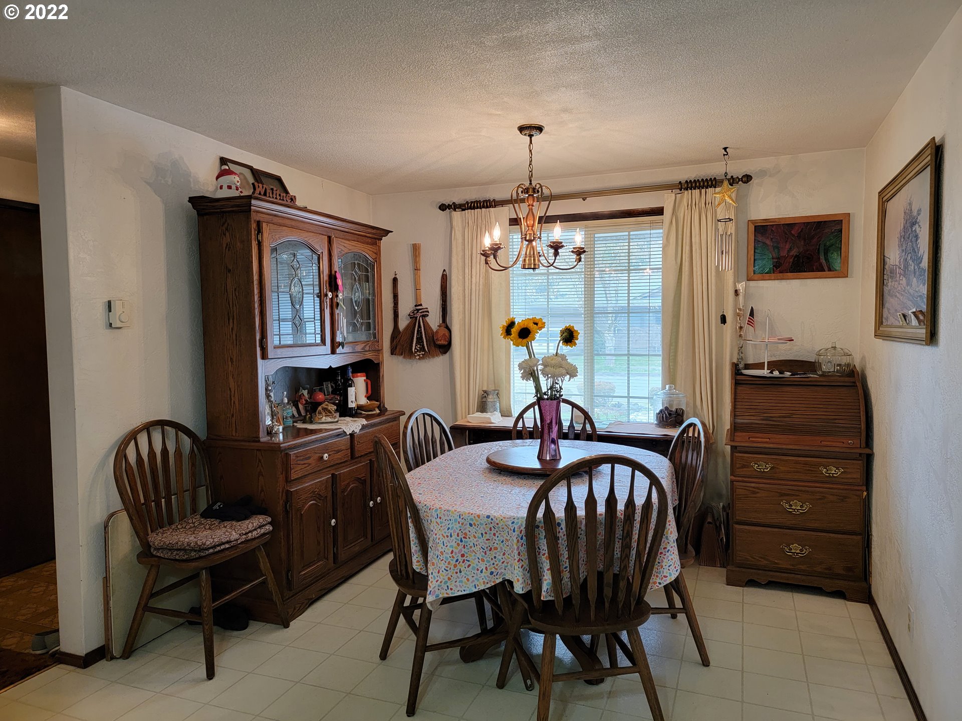 2287 8th Street Springfield, OR 97477 - Photo 7 of 18 a view of a dining room with furniture