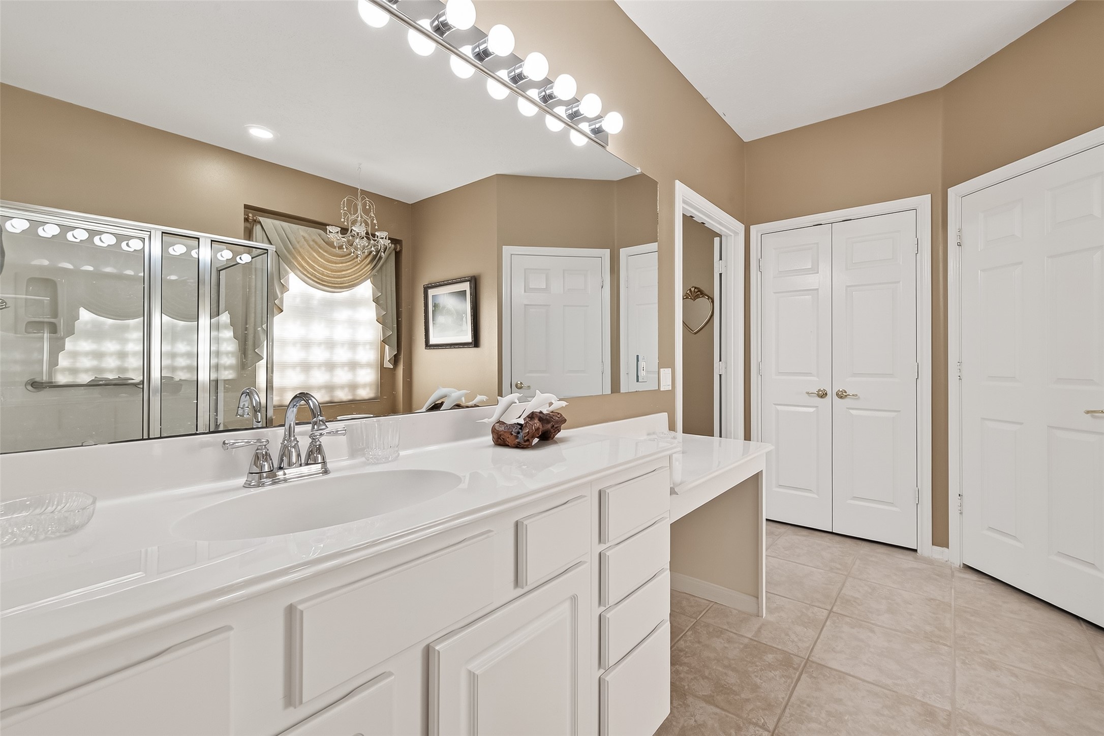 71 Ember Pines Court Conroe, TX 77384 - Photo 19 of 29 a bathroom with a double vanity sink mirror and double