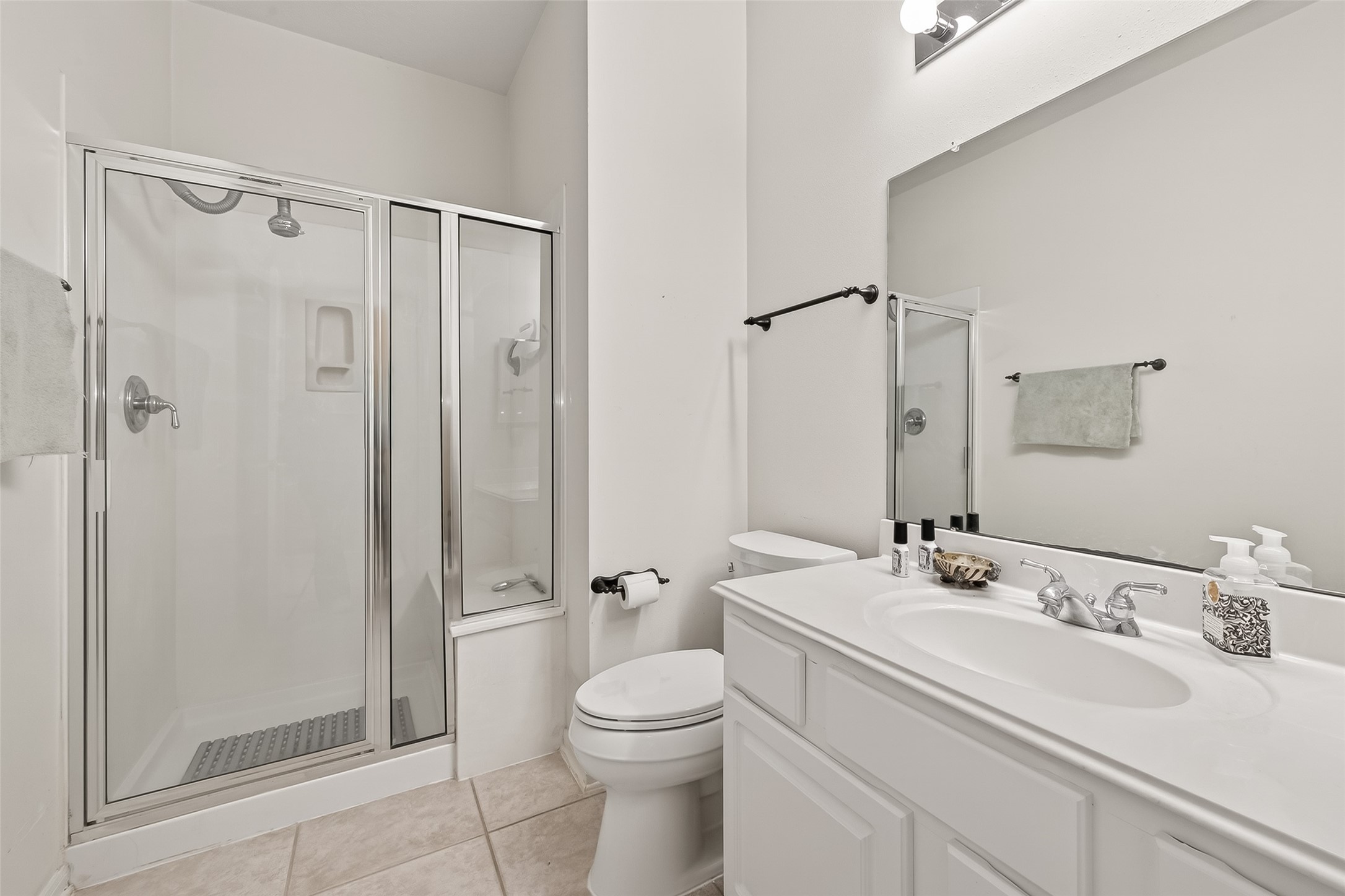 71 Ember Pines Court Conroe, TX 77384 - Photo 21 of 29 a bathroom with a sink toilet and shower