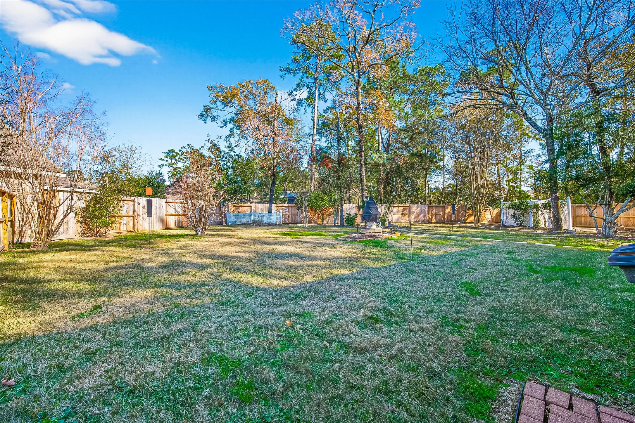 71 Ember Pines Court Conroe, TX 77384 - Photo 26 of 29 a view of a playground with basketball court