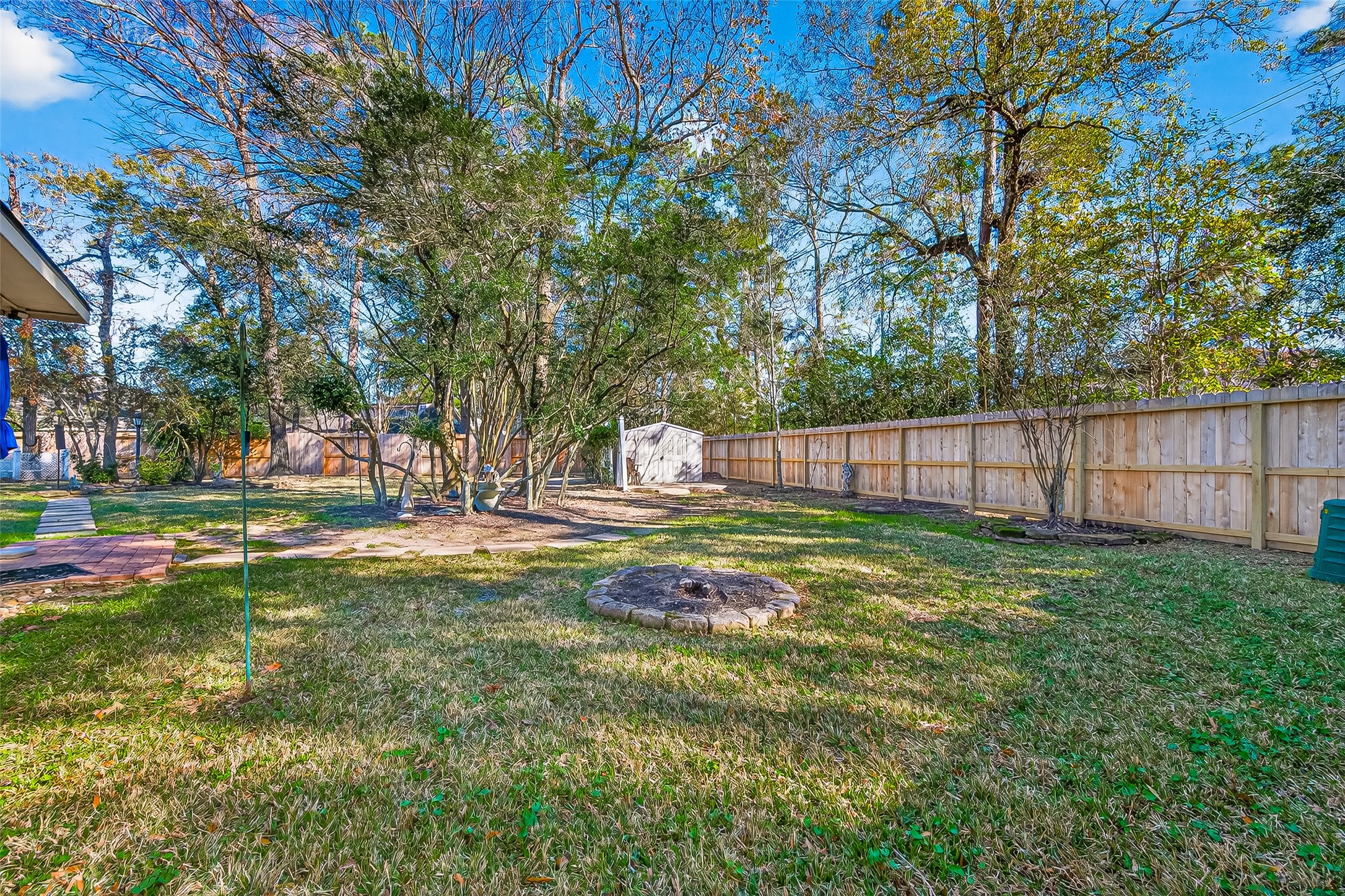 71 Ember Pines Court Conroe, TX 77384 - Photo 27 of 29 a view of a park with large trees