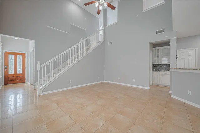 a view of an entryway with stairs