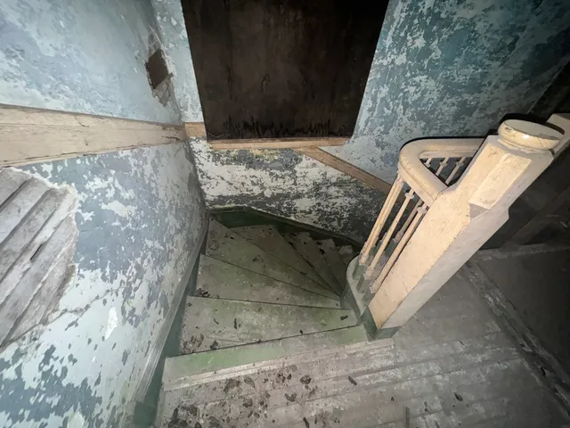 a view of balcony with furniture