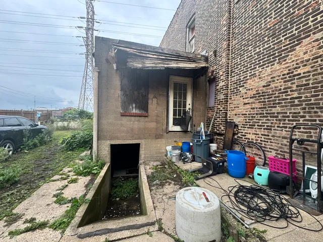 a front view of a house with patio