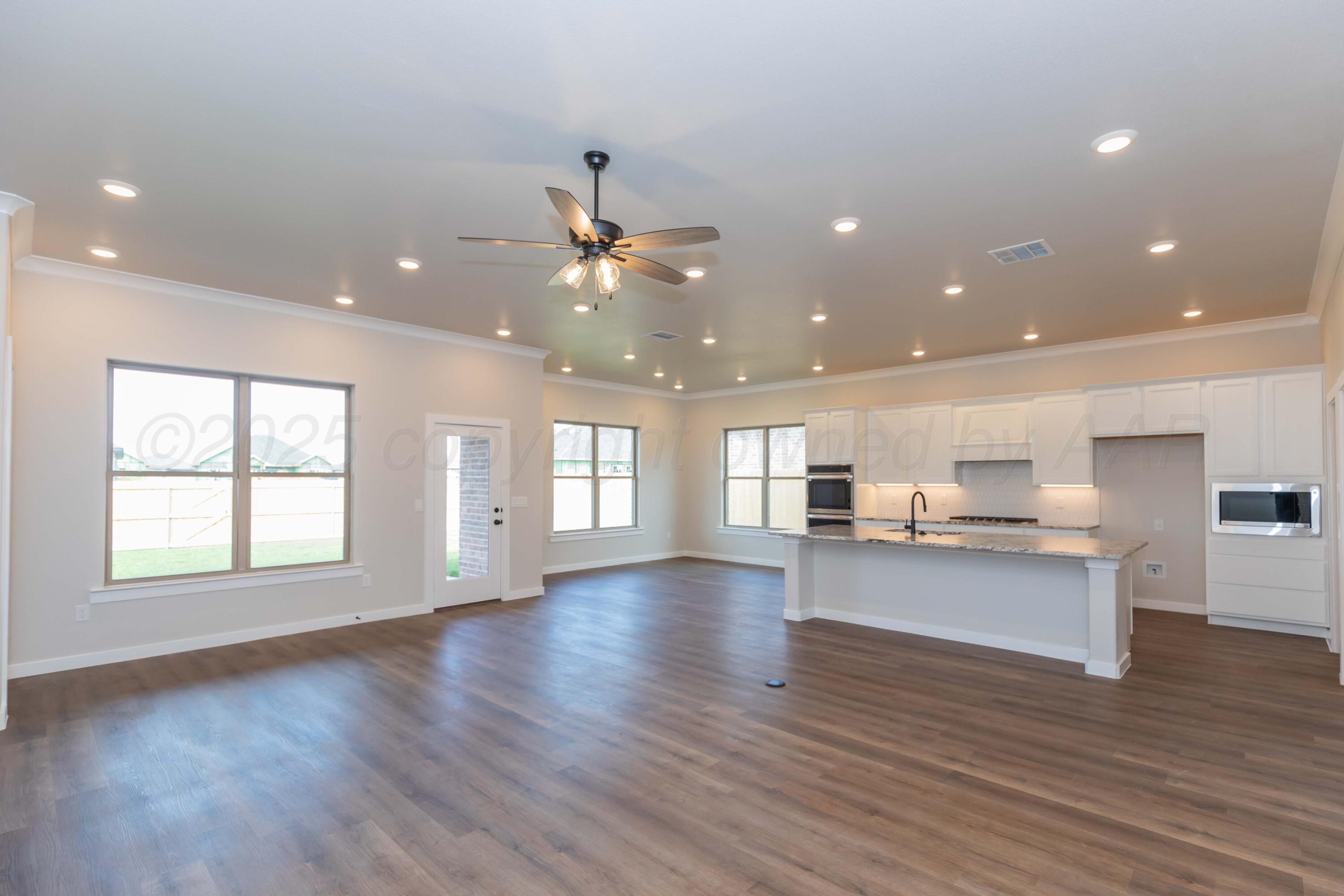 7606 Castleman Road Amarillo, TX 79119 - Photo 5 of 26 LIVING ROOM VIEW 2