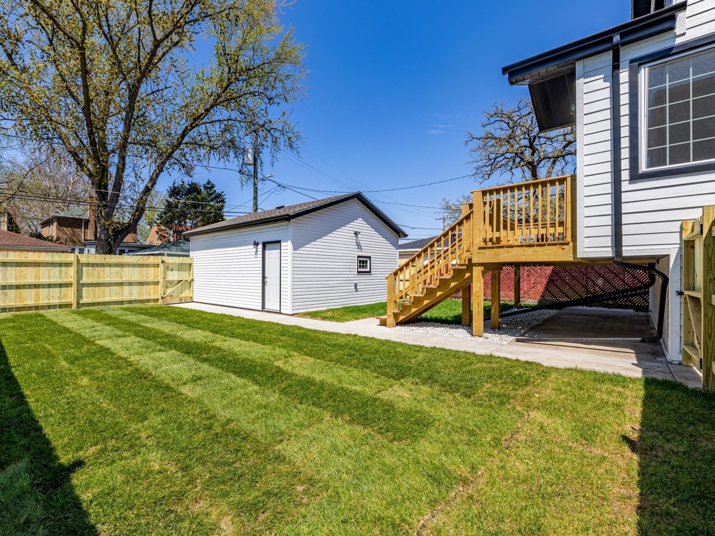 3548 Clinton Avenue Berwyn, IL 60402 - Photo 46 of 49 a view of a house with backyard and a tree