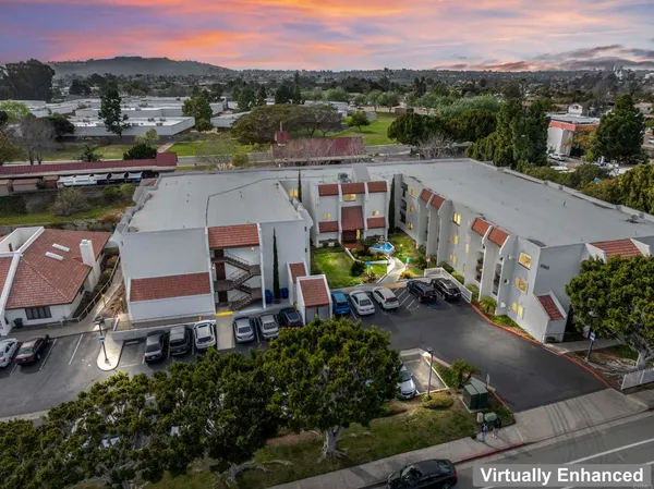 a view of a city and a mountain