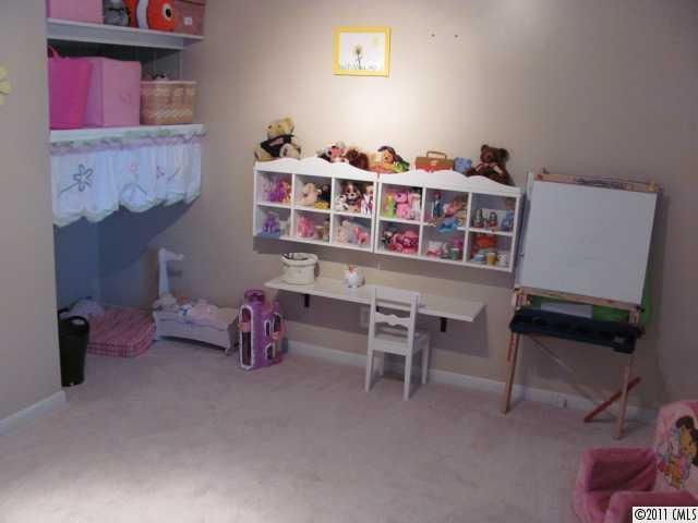 3800 Churchill Road, Unit 1 Charlotte, NC 28211 - Photo 11 of 16 a room with furniture and a table