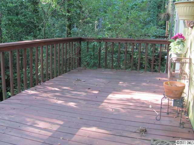 3800 Churchill Road, Unit 1 Charlotte, NC 28211 - Photo 16 of 16 a view of a balcony with wooden floor