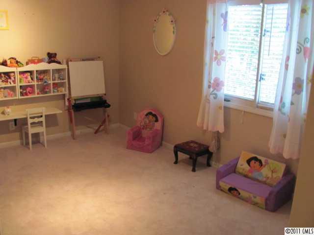 3800 Churchill Road, Unit 1 Charlotte, NC 28211 - Photo 10 of 16 a room with furniture and a window