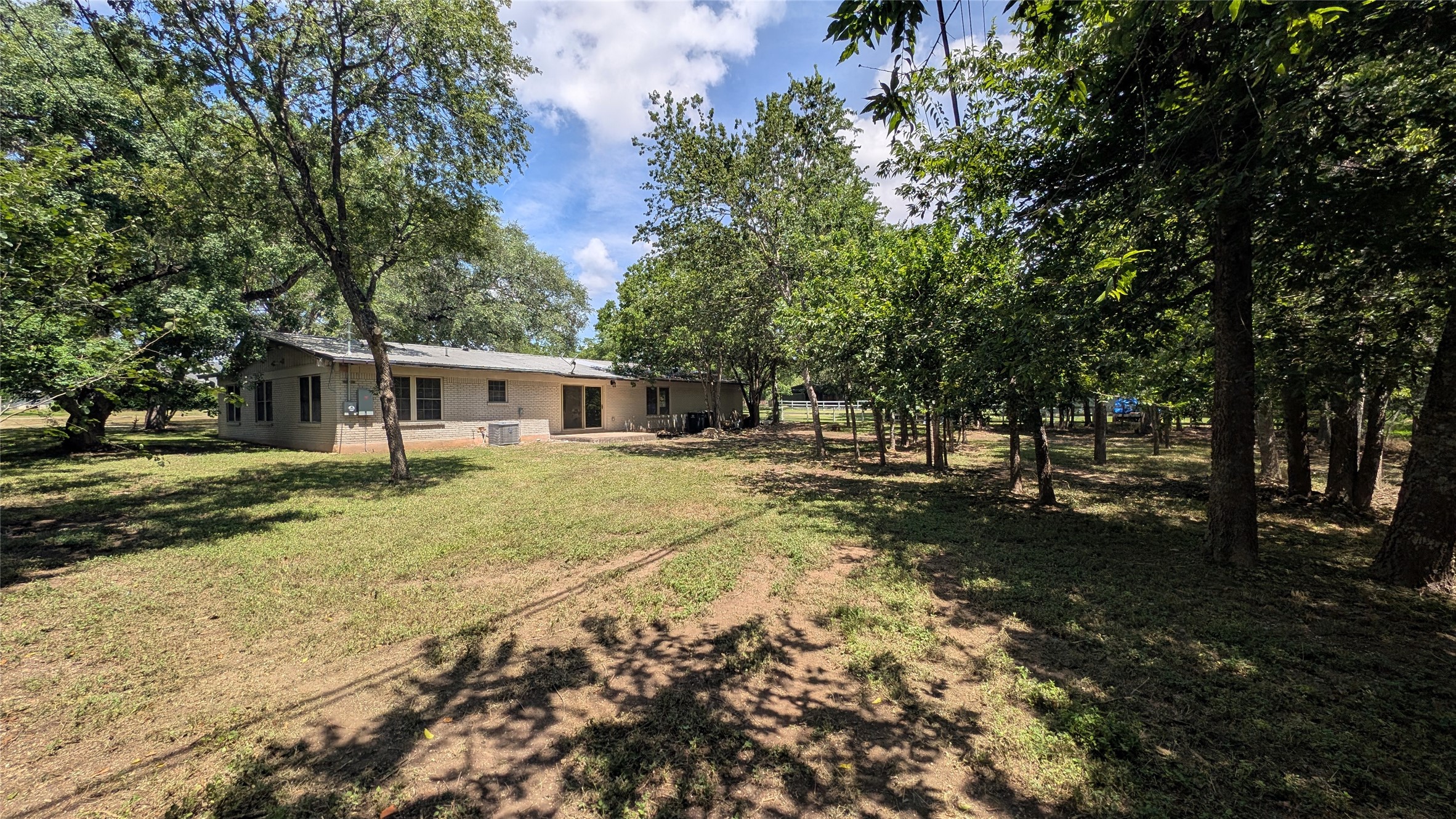 11811 Sleepy Hollow Road Manchaca, TX 78652 - Photo 28 of 31 a view of a house with a yard