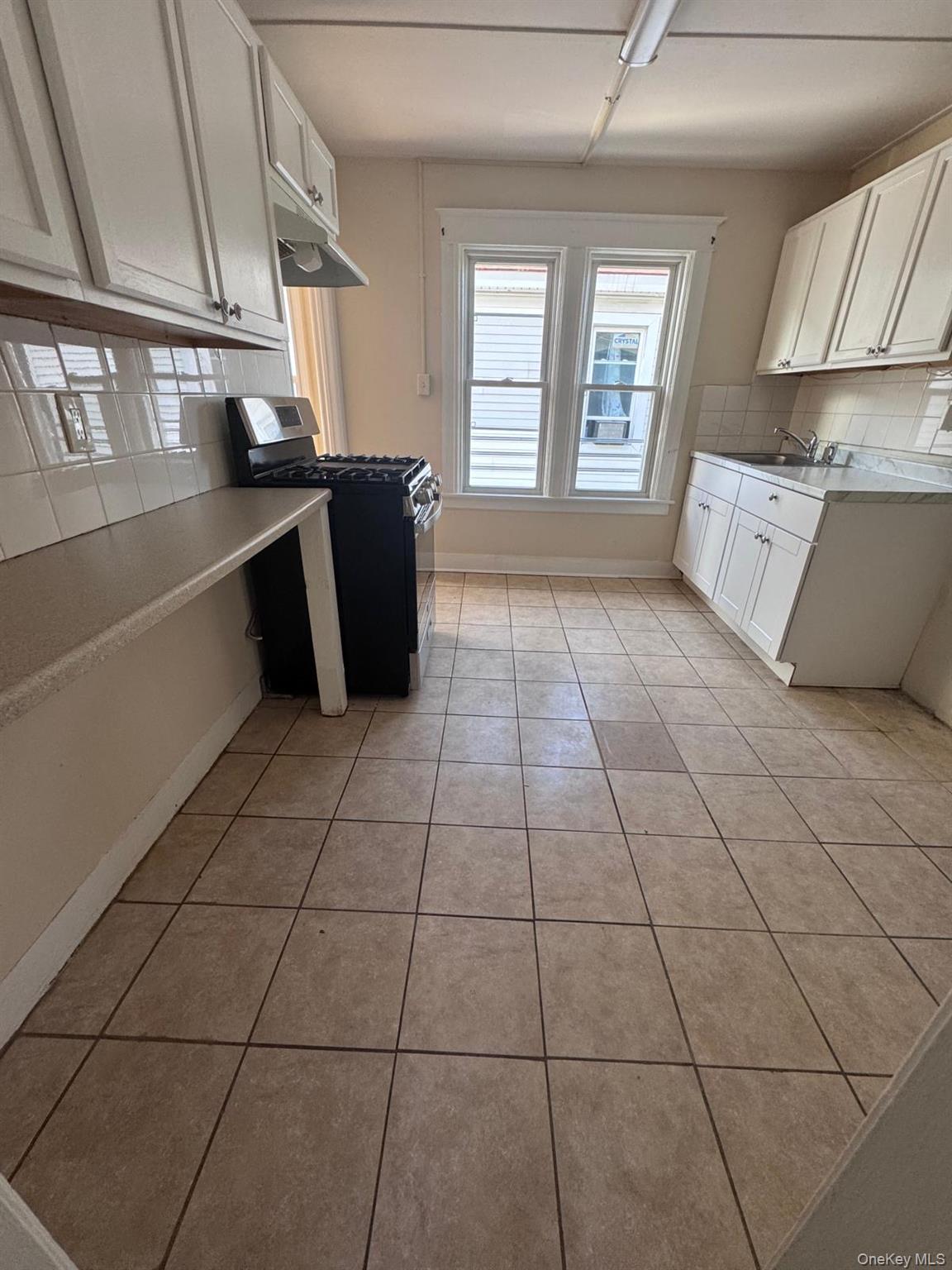 25 Lent Street, Unit 2 Poughkeepsie, NY 12601 - Photo 12 of 14 a view of a livingroom with wooden floor