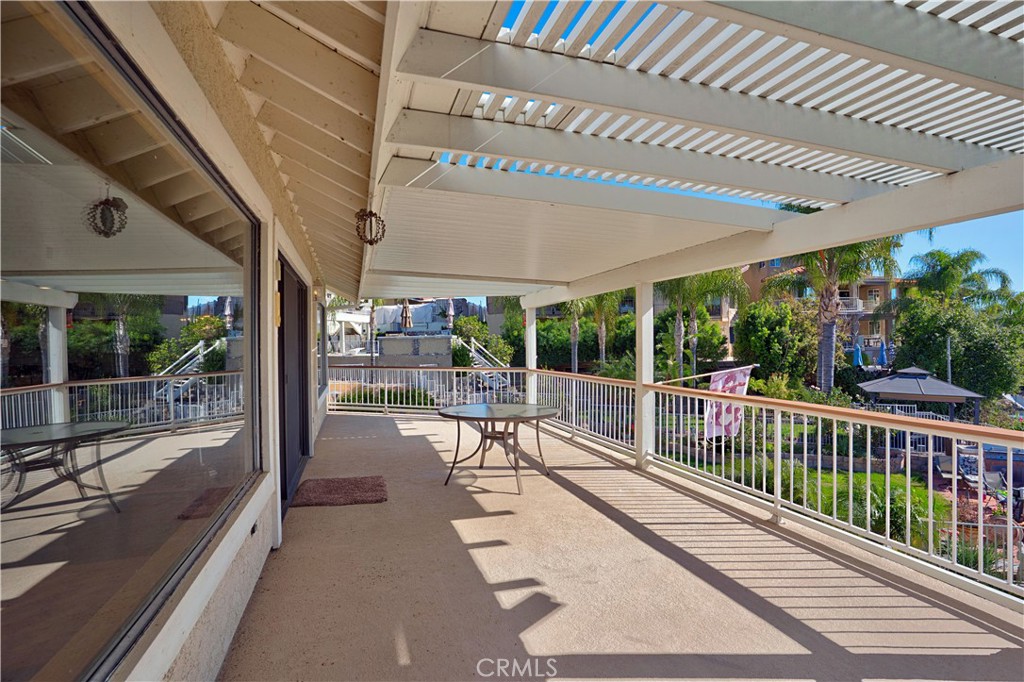 30026 Big Range Road Canyon Lake, CA 92587 - Photo 14 of 48 a view of a porch with chairs and backyard