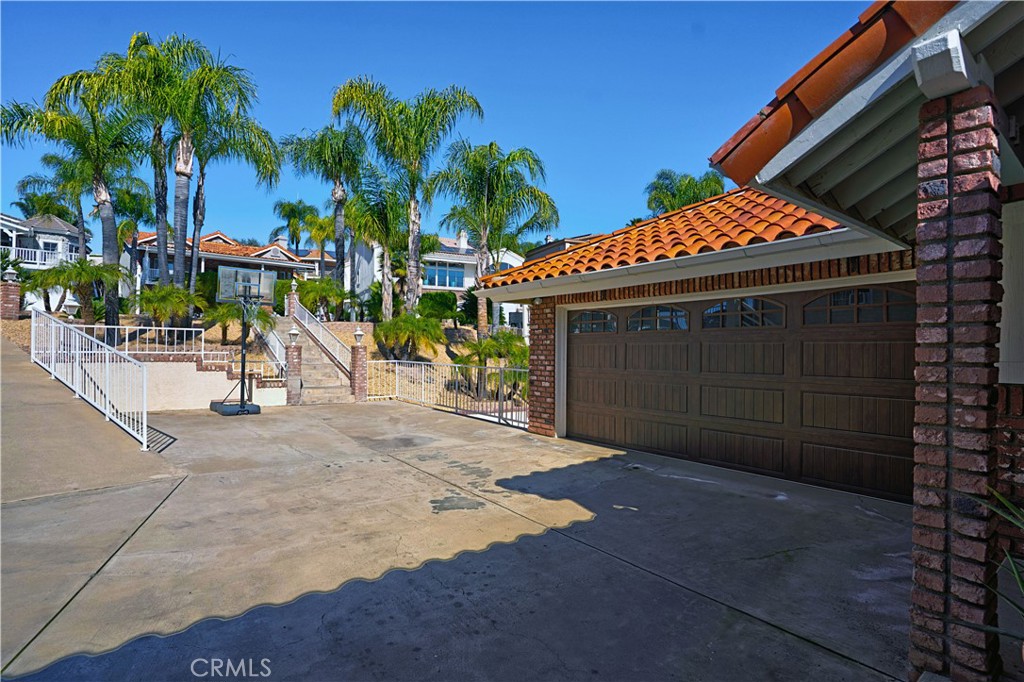 30026 Big Range Road Canyon Lake, CA 92587 - Photo 32 of 48 a view of a house with a yard