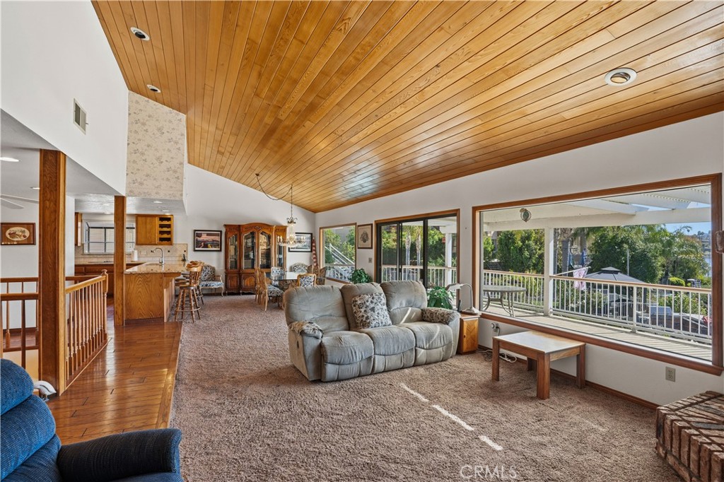 30026 Big Range Road Canyon Lake, CA 92587 - Photo 5 of 48 a living room with furniture and a floor to ceiling window