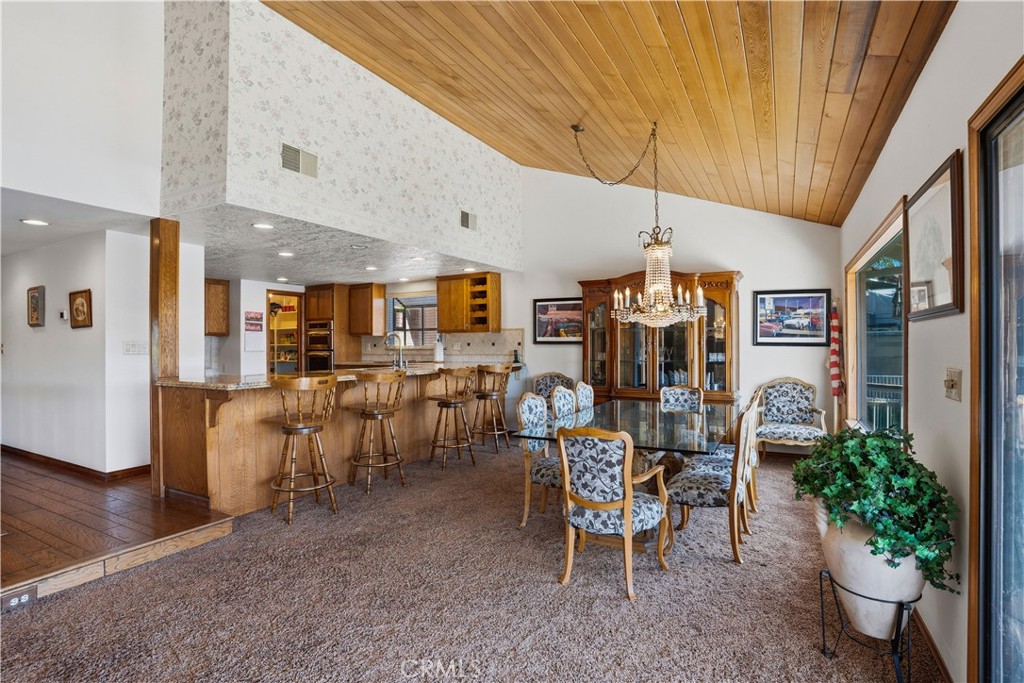 30026 Big Range Road Canyon Lake, CA 92587 - Photo 8 of 48 a view of a dining room with furniture window and outside view