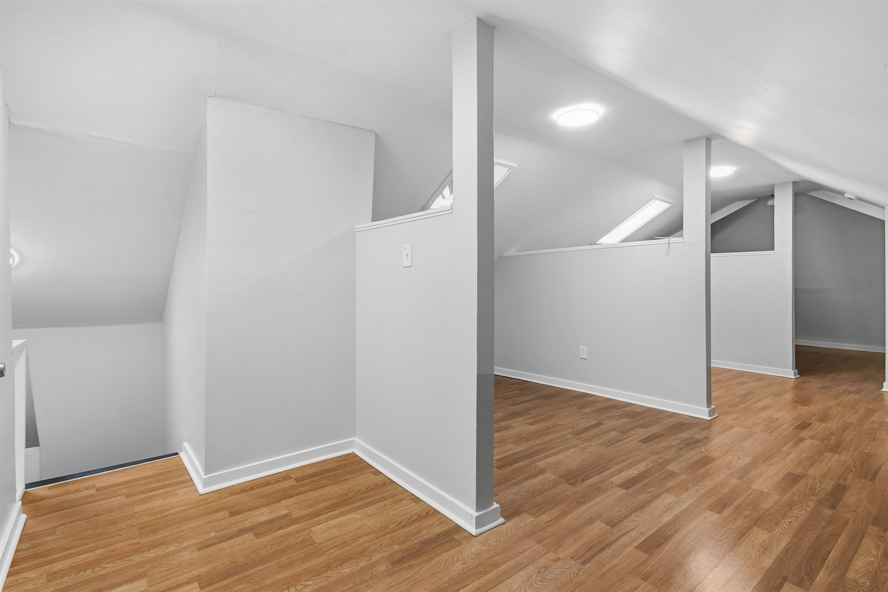 871 University Street Memphis, TN 38107 - Photo 16 of 26 a view of an empty room with wooden floor