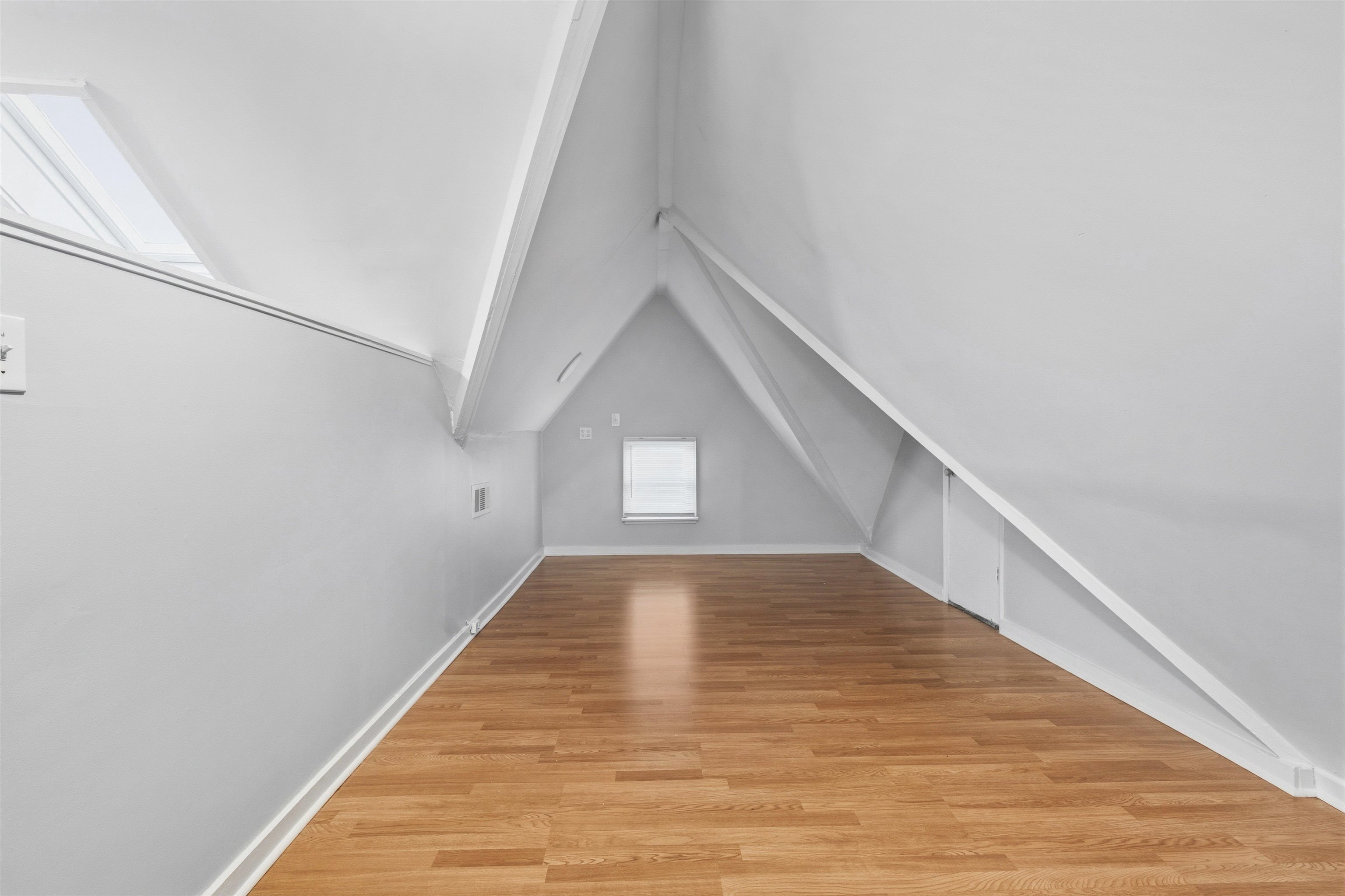 871 University Street Memphis, TN 38107 - Photo 18 of 26 a view of hallway with wooden floor