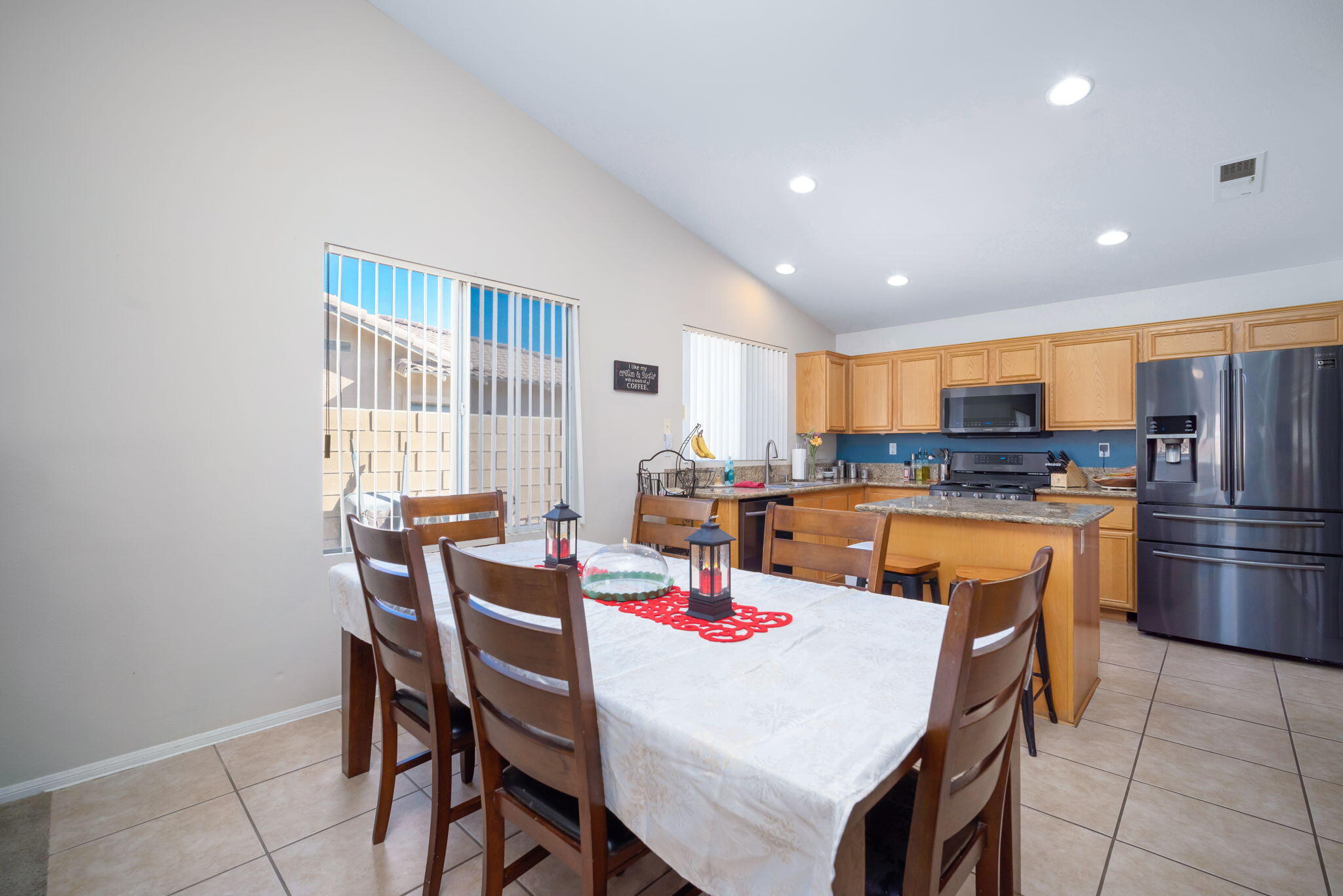79350 Paseo Del Rey La Quinta, CA 92253 - Photo 14 of 41 a large kitchen with a table and chairs