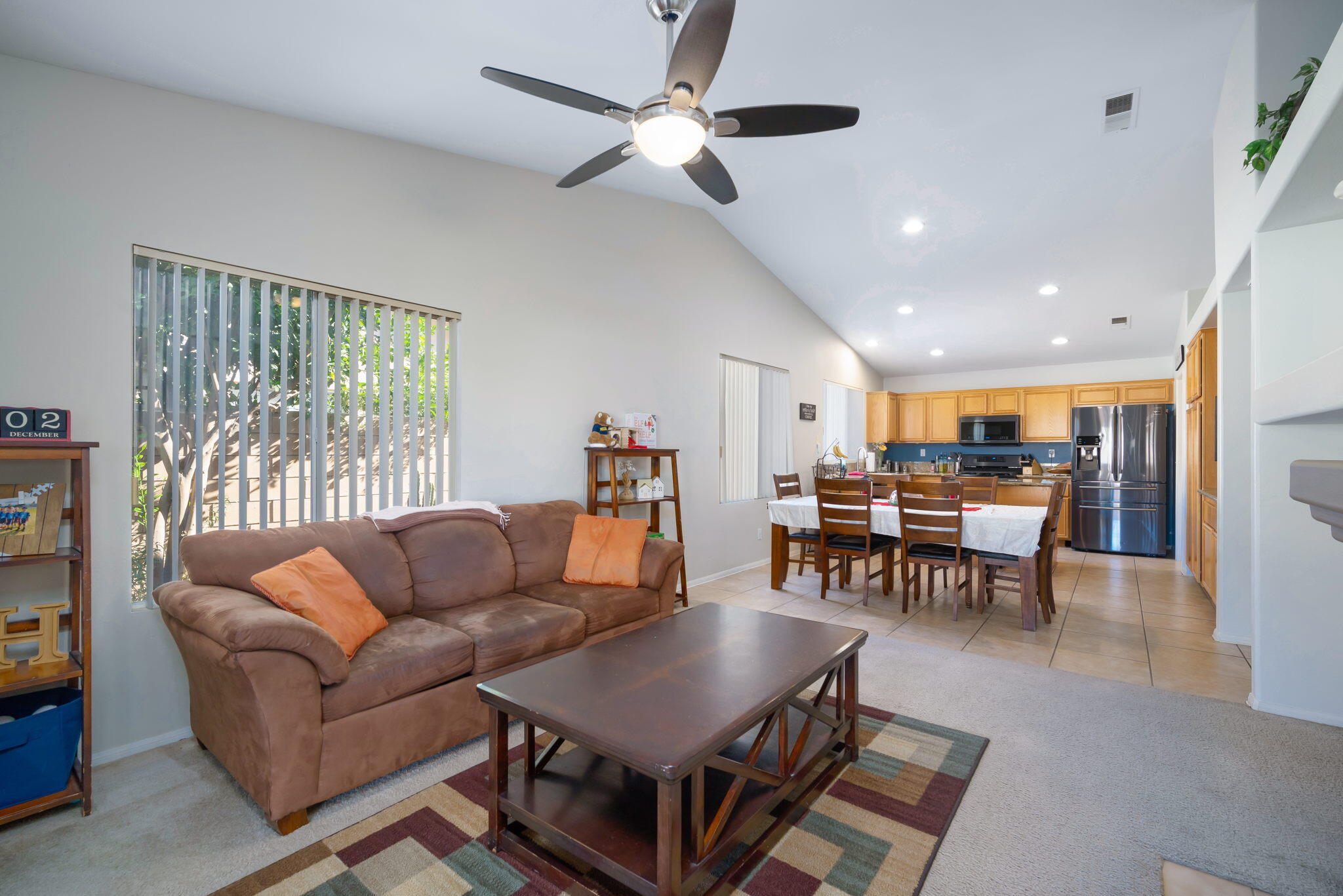 79350 Paseo Del Rey La Quinta, CA 92253 - Photo 15 of 41 a living room with furniture kitchen view and a large window