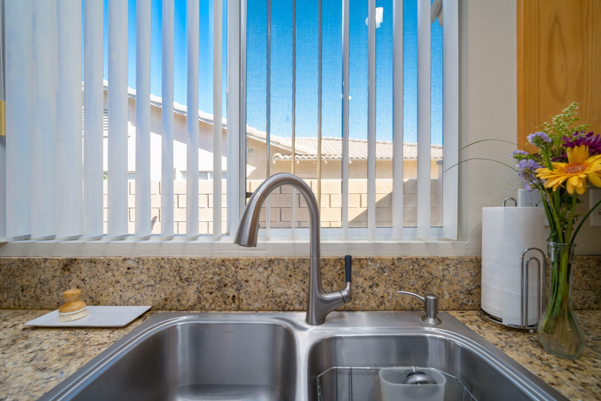 79350 Paseo Del Rey La Quinta, CA 92253 - Photo 17 of 41 a kitchen with granite countertop a sink and a stove