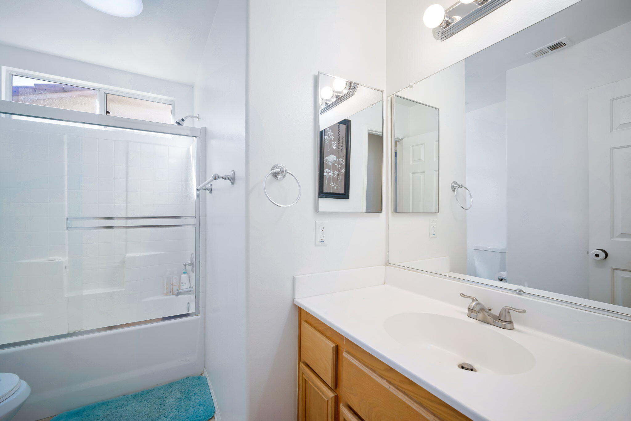 79350 Paseo Del Rey La Quinta, CA 92253 - Photo 24 of 41 a bathroom with a shower sink and mirror