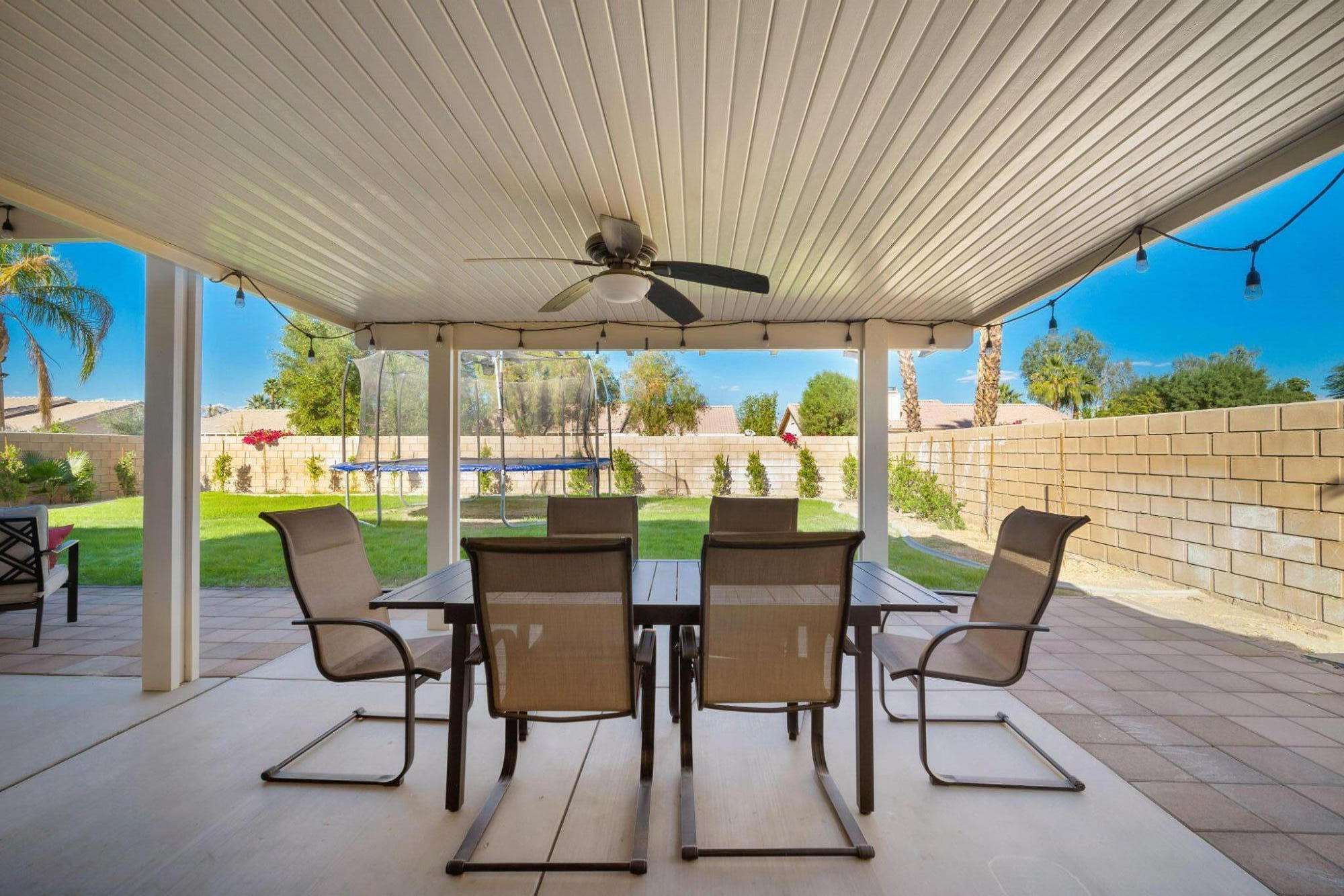 79350 Paseo Del Rey La Quinta, CA 92253 - Photo 34 of 41 a view of a dining area with furniture window and outside view