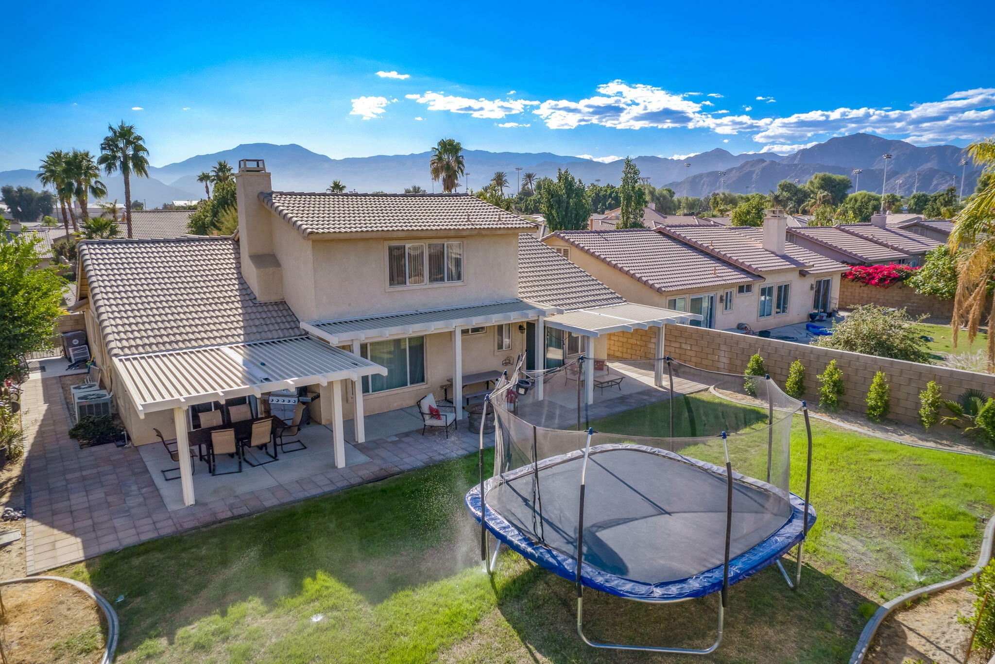 79350 Paseo Del Rey La Quinta, CA 92253 - Photo 38 of 41 a view of a house with swimming pool and sitting area