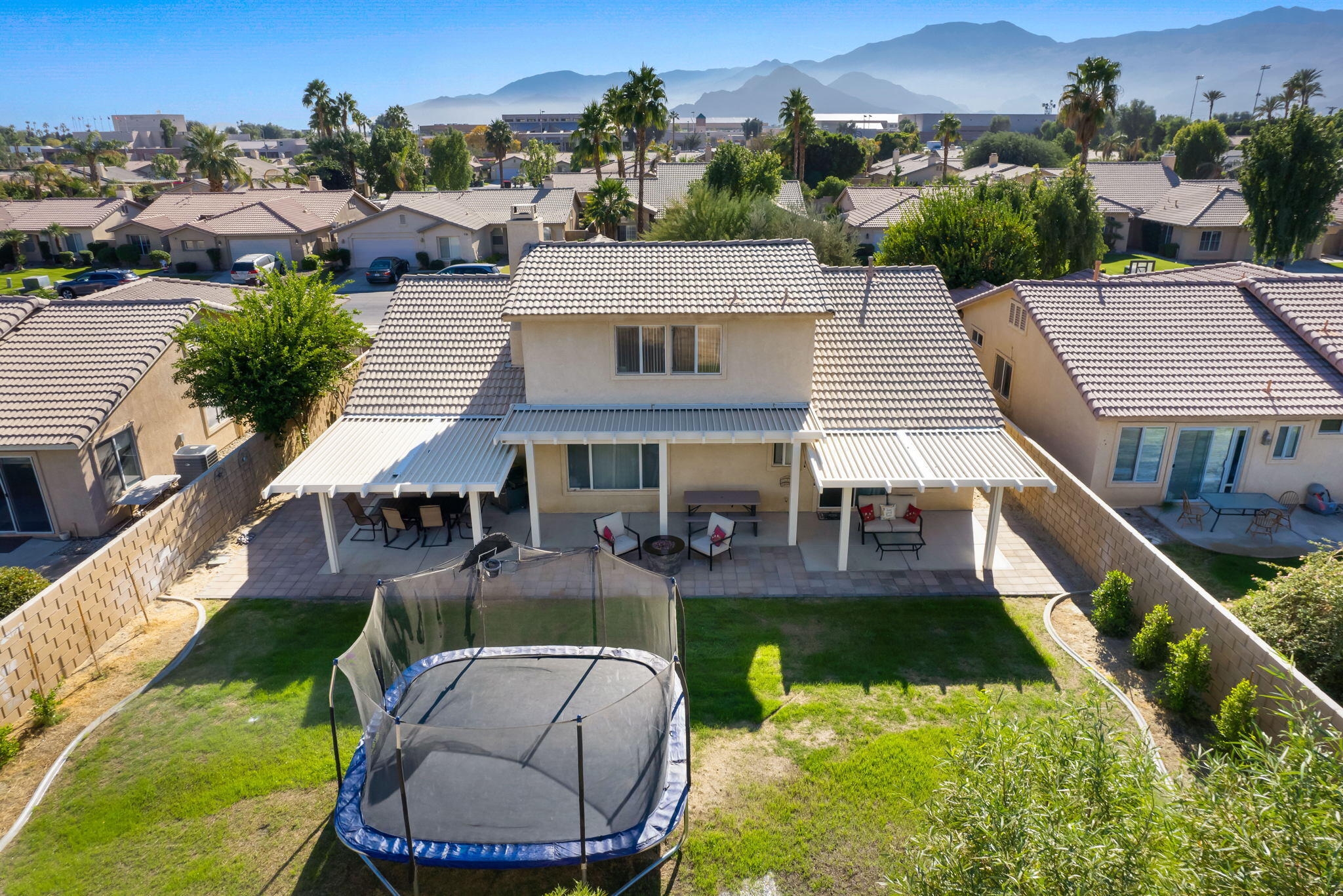 79350 Paseo Del Rey La Quinta, CA 92253 - Photo 39 of 41 an aerial view of a house with swimming pool and a yard