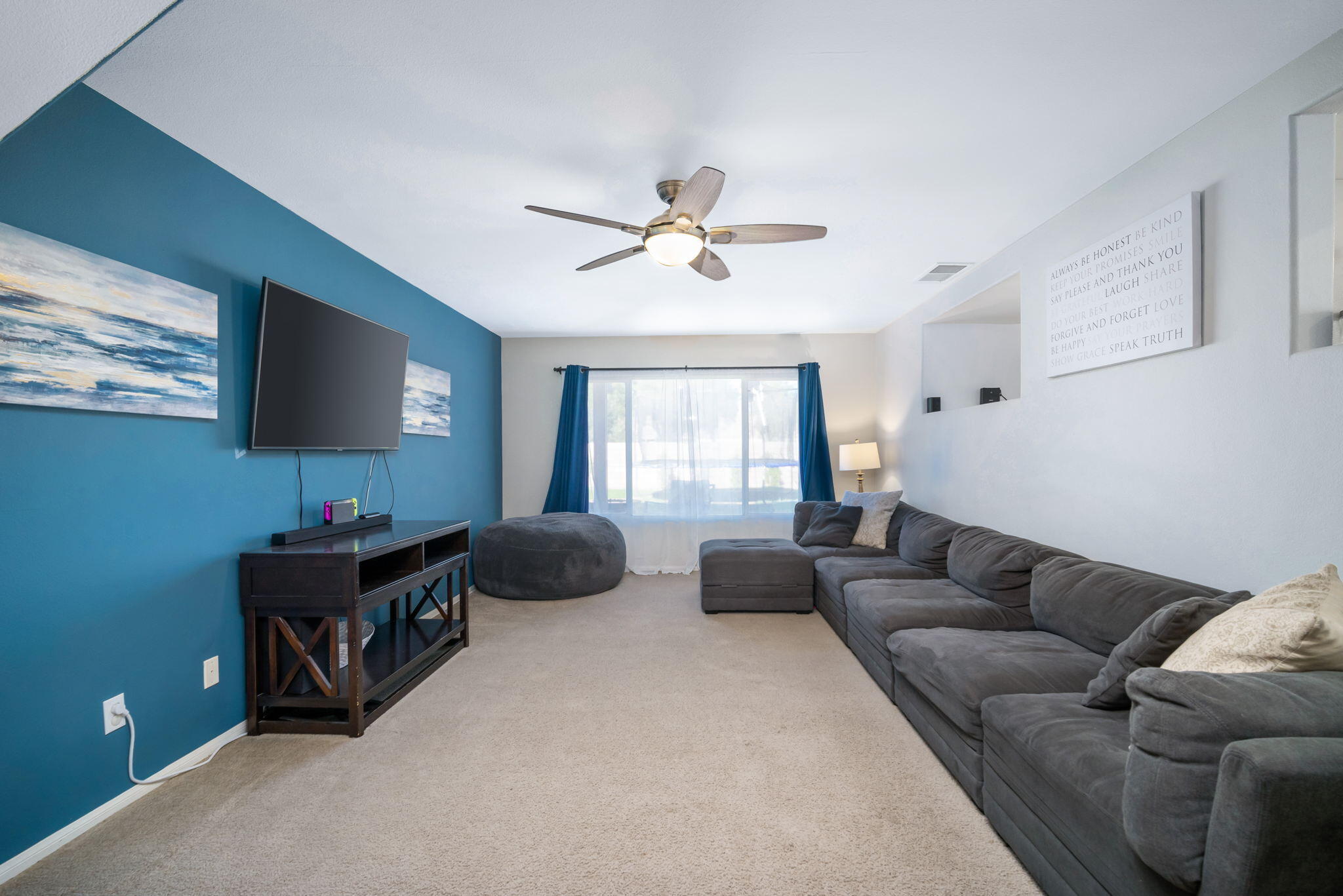 79350 Paseo Del Rey La Quinta, CA 92253 - Photo 6 of 41 a living room with furniture and a flat screen tv